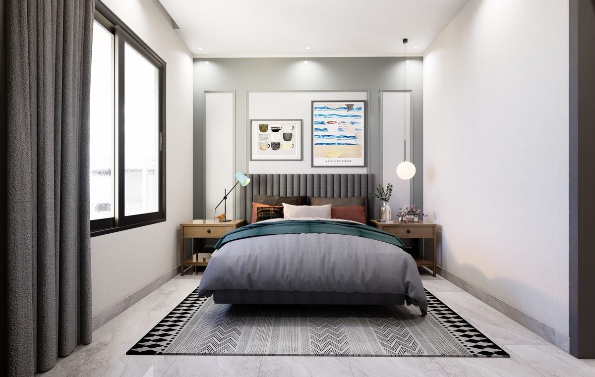 Bedroom of a 2 BHK apartment with fitted wardrobes